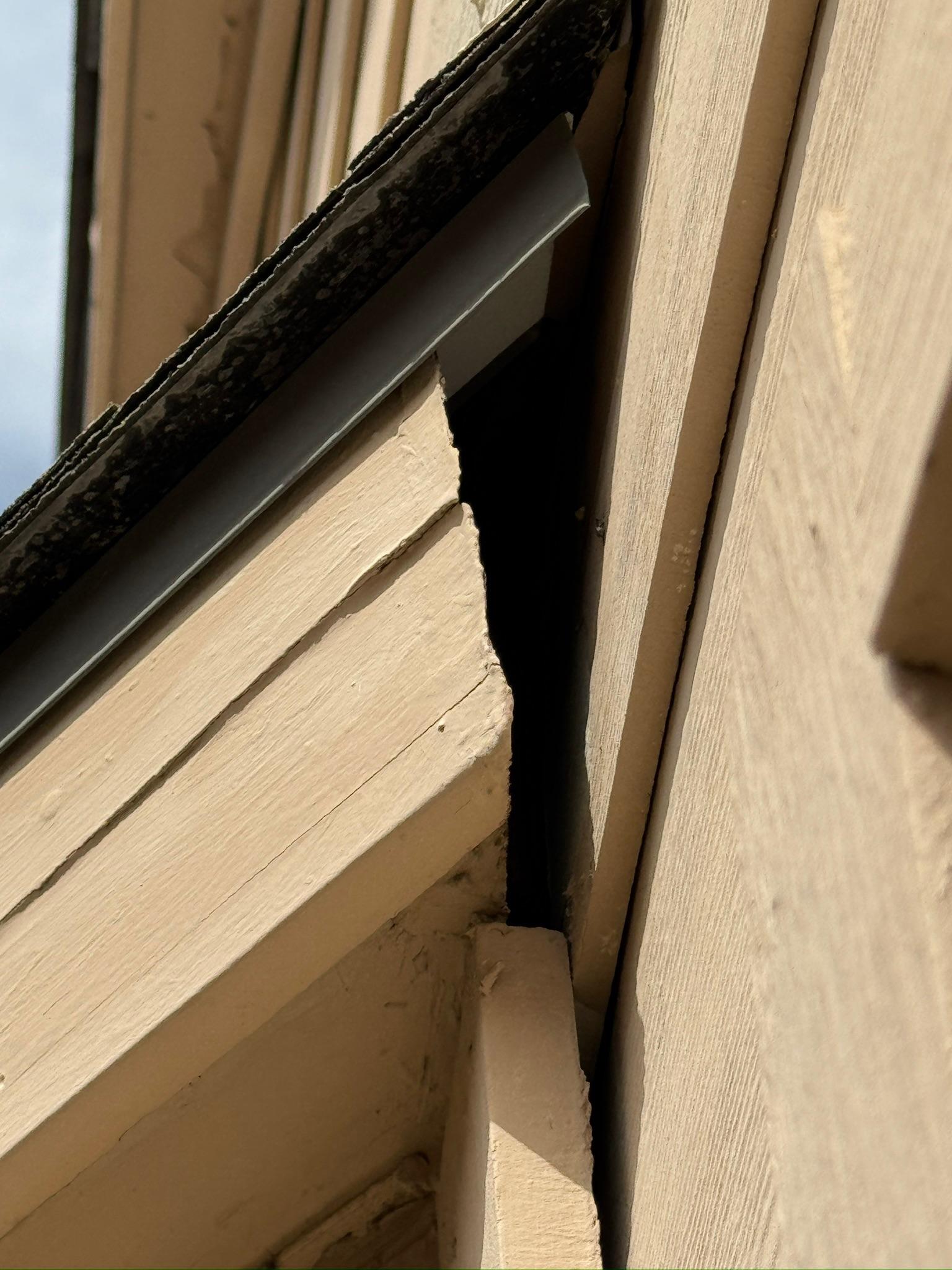 Open joint between exterior fascia boards below a gutter